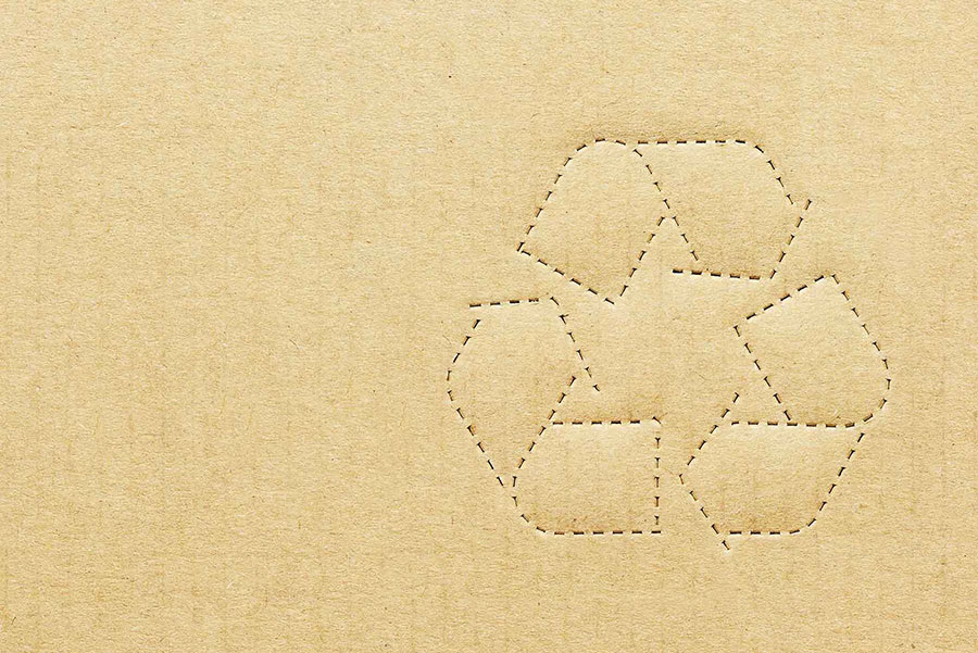 Carton portant le symbole du recyclage